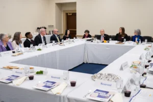 Participants join in MAZON's 16th annual National Hunger Seder in Washington, DC. (Credit: Lacey Johnson Photography)