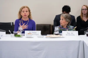 Rep. Debbie Wasserman Schultz (D-FL) and Rep. Jan Schakowsky (D-IL) address MAZON's 16th annual National Hunger Seder in Washington, DC. (Credit: Lacey Johnson Photography)